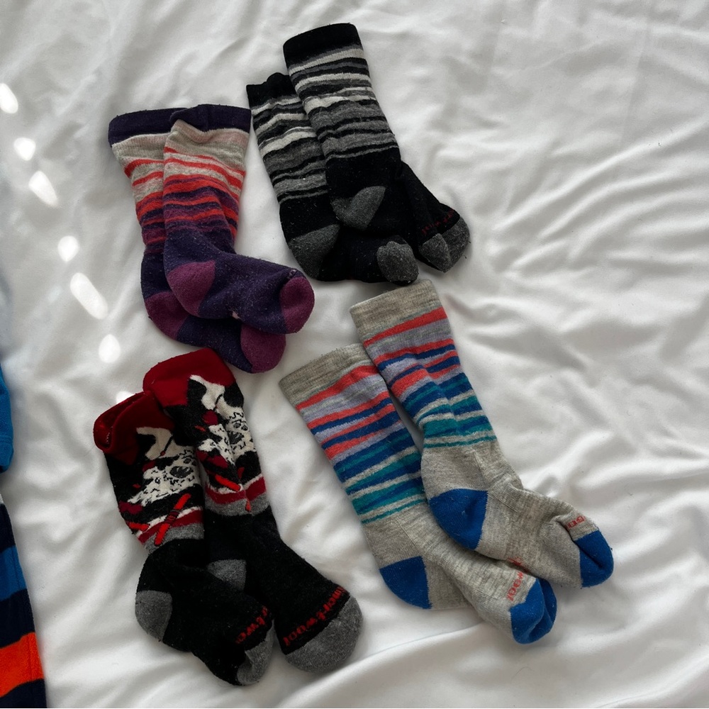 Smartwool kids snow socks, set of 4. Up to size 12 little kid shoe
